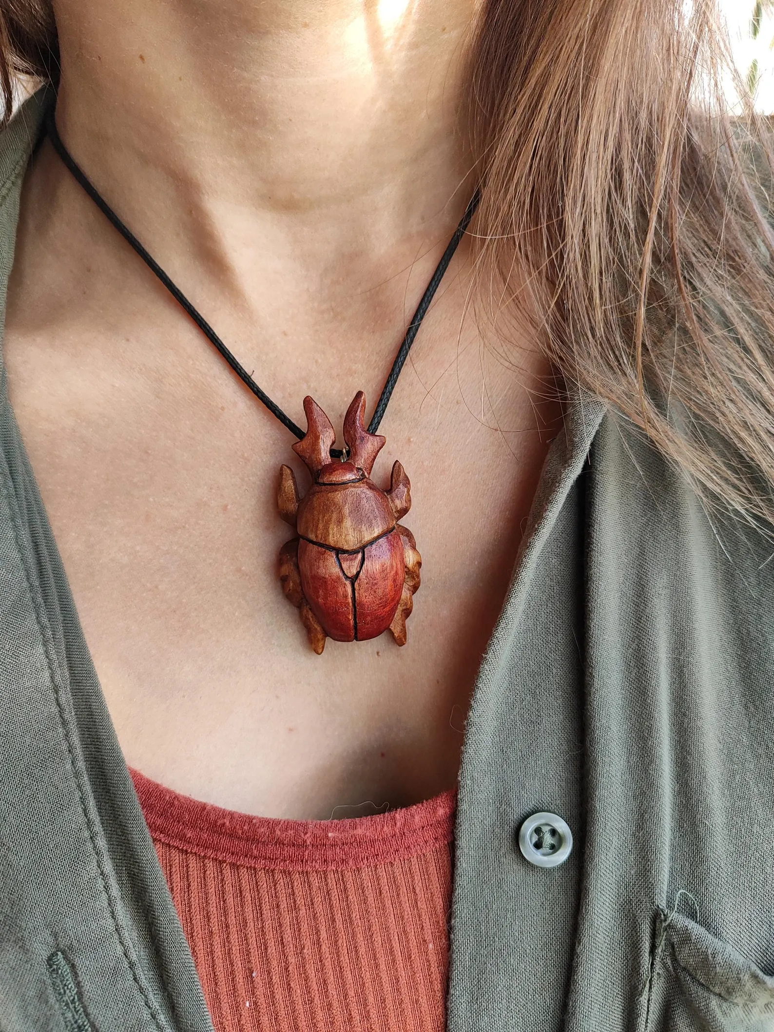 Horned beetle necklace